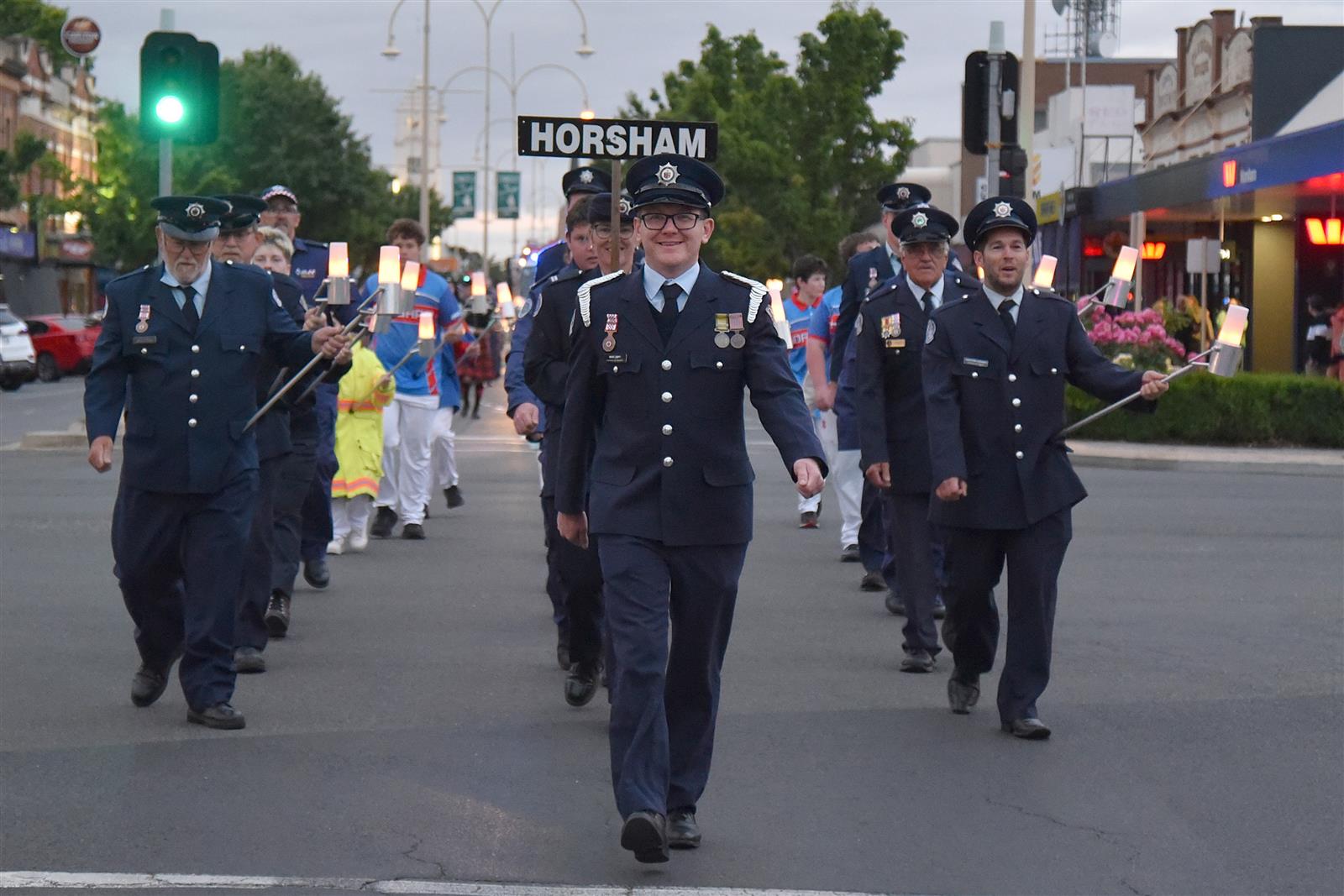 Horsham Fire Brigade Captain Marc Ampt leads the torchlight procession down Firebrace Street